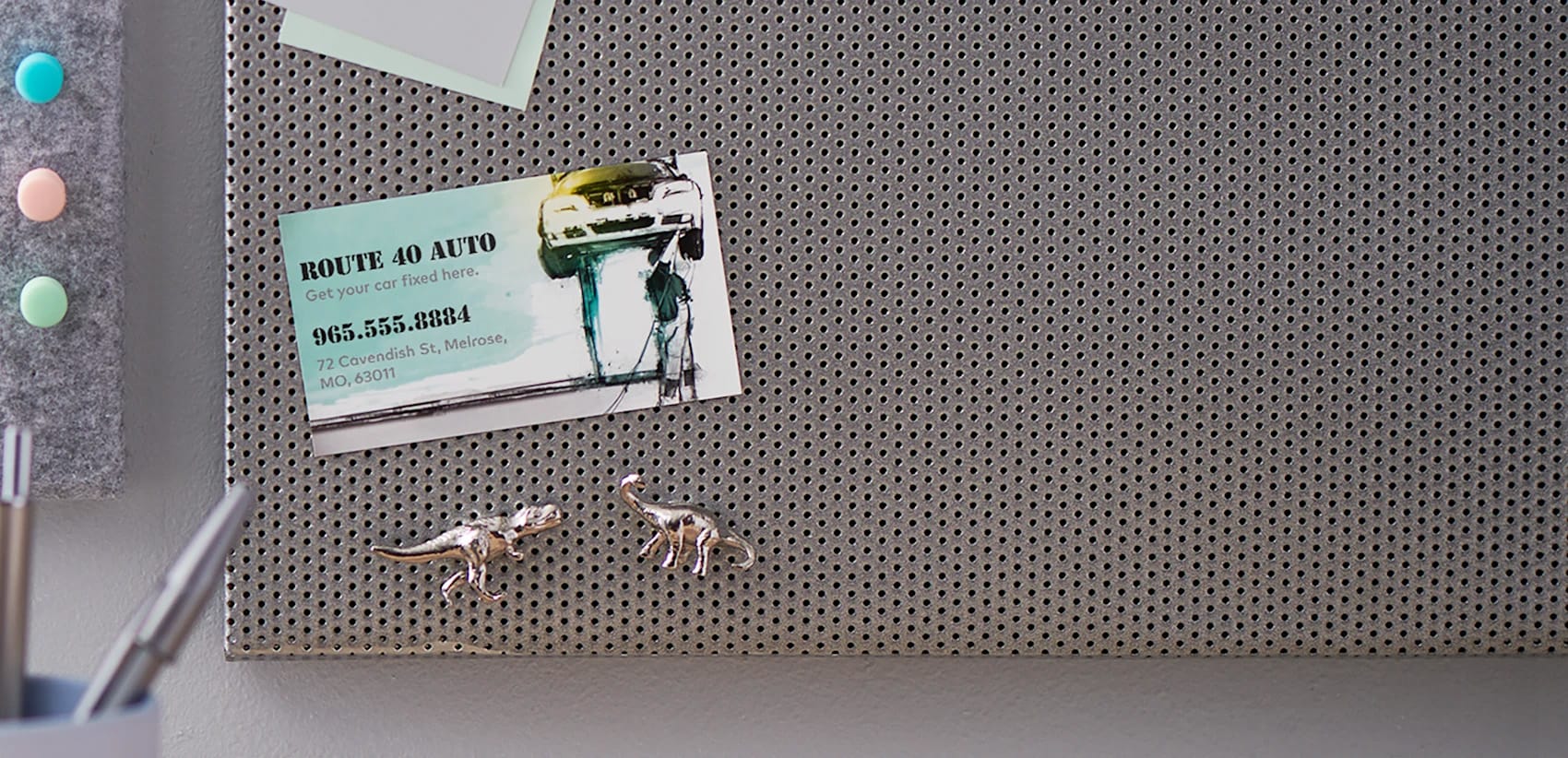 A magnetic business card on a metal surface