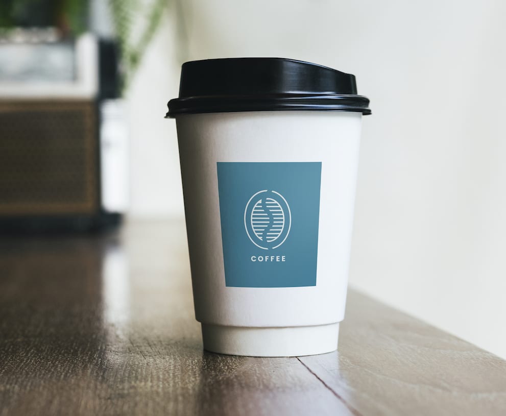 A minimalist packaging design for a coffee cup