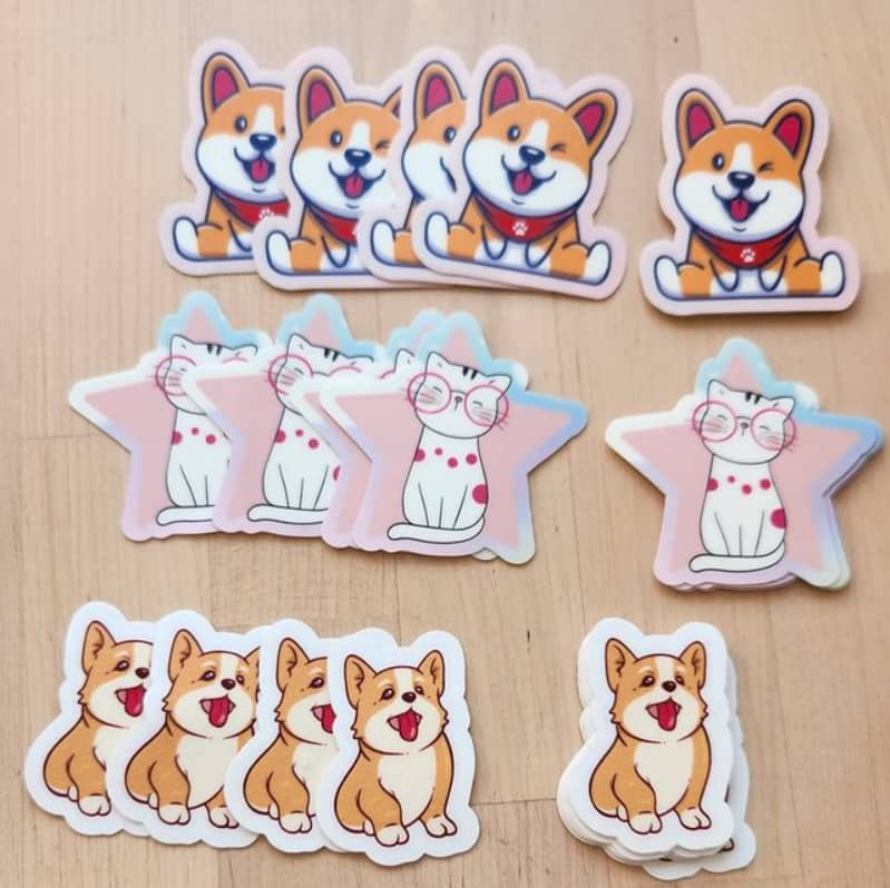 Custom die-cut stickers in the shape of dogs and cats