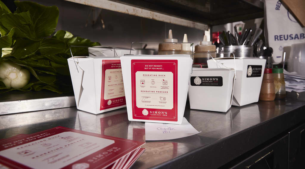 Custom food delivery packaging on a counter