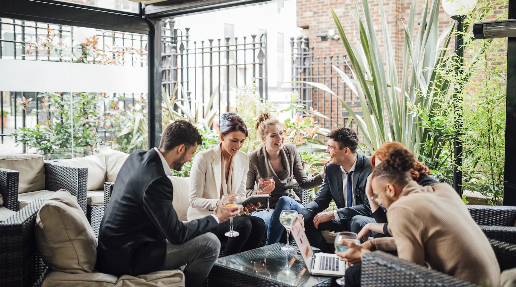 A group of small business owners networking at a local bar
